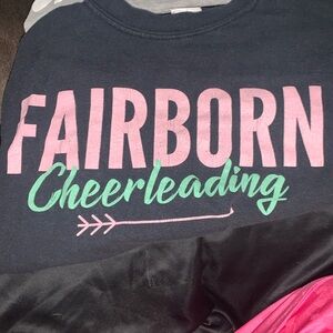 Two cheerleading t shirts